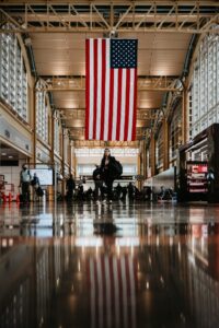 how to start a travel blog. An image of a traveler in the airport